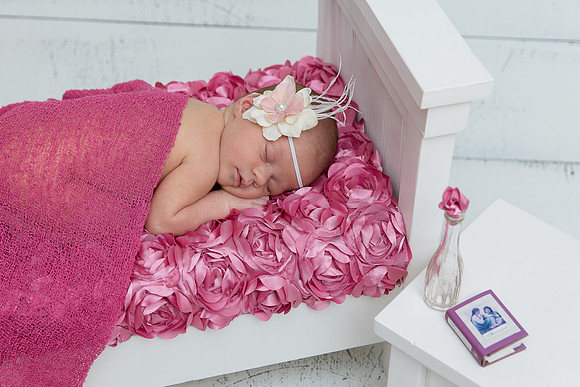 Newborn Posed with Miniature Bedroom Set