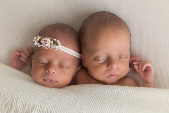 Newborn Twins Holding Hands Captured by Denver Colorado Photographer Donna Young
